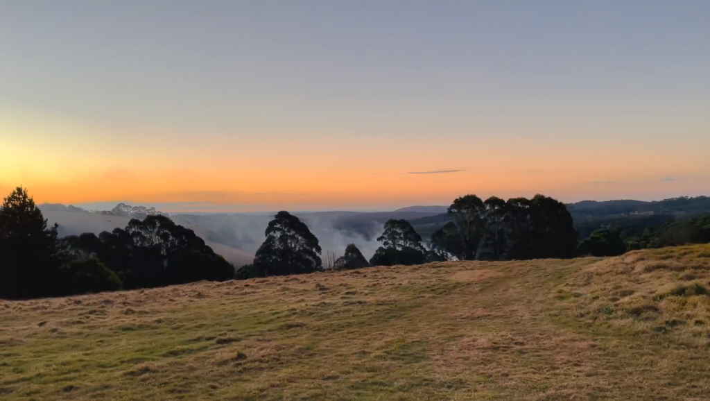 View across the paddocks at Inkungu Farm, Robertson, at sunset